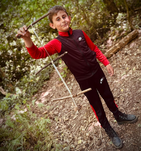 Student partaking in a forest school lesson